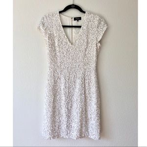 Parker white sequin dress.